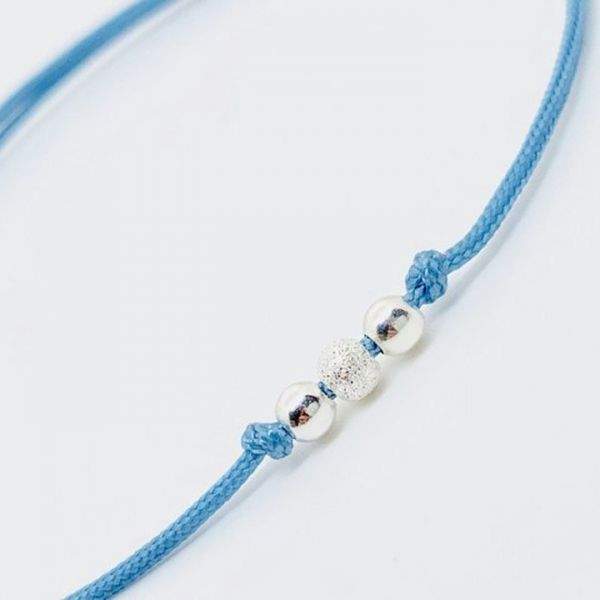 Bracelet cordon ajustable porte-bonheur perles en argent massif