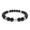 Bracelet élastique perles en verre noir, acier inoxydable et croix en argent massif