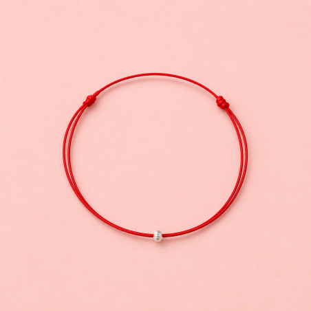 Bracelet cordon ajustable, perle striée en argent massif